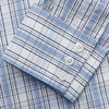 View 3 of product The Turnbull & Asser Tonal Blue Check Regular Fit Shirt with T&A collar and 3-button cuffs is displayed flat on a white background, highlighting its blue and white plaid pattern and long sleeves.