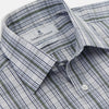 View 2 of product The Tonal Green Check Regular Fit Shirt by Turnbull & Asser features a T&A collar, 3-button cuffs, and a blue and white plaid pattern, crafted from Italian cotton poplin. Displayed on a white background.