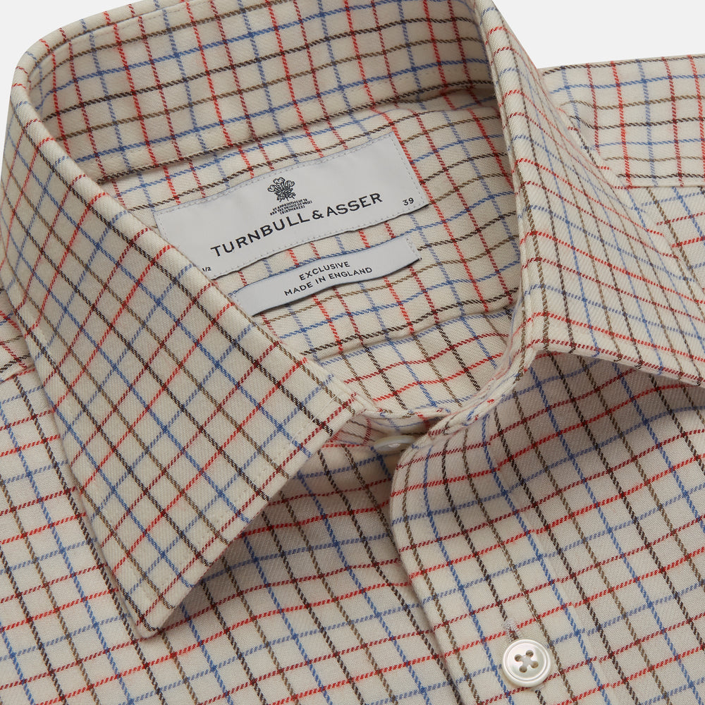 The Pink Multi Check Cotton-Cashmere Shirt by Turnbull & Asser features a T&A collar, 3-button cuffs, and a soft blend fabric in brown, beige, blue, and subtle pink checks—ideal for smart-casual style.