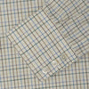 View 5 of product The Turnbull & Asser Green Multi Check Cotton-Cashmere Shirt features a T&A collar, 3-button cuffs, and a tonal green, beige, and blue check pattern. Shown flat against a white background.