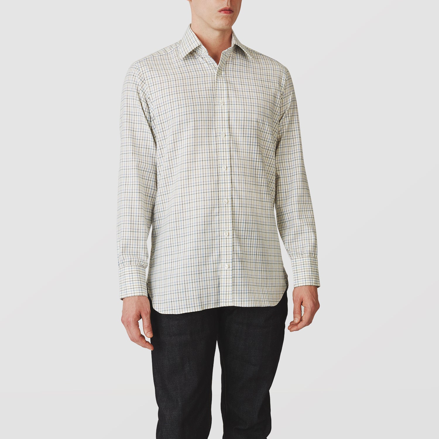 View 2 of product The Turnbull & Asser Green Multi Check Cotton-Cashmere Shirt features a T&A collar, 3-button cuffs, and a tonal green, beige, and blue check pattern. Shown flat against a white background.