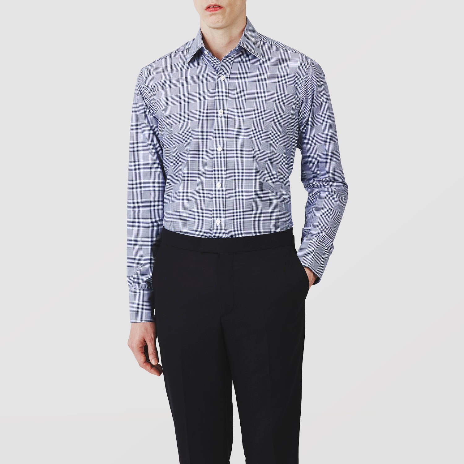 View 2 of product The Turnbull & Asser Navy Check Shirt, featuring a T&A collar and 3-button cuffs, is displayed on a white background.