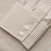 View 3 of product The Sand Gingham Check Regular Fit Shirt by Turnbull & Asser features a T&A collar, 3-button cuffs, and a sand gingham check pattern on white.