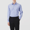 View 2 of product A neatly folded Turnbull & Asser Blue Stripe Regular Fit Shirt with T&A collar and square double cuffs, featuring long sleeves and thin white stripes on a light blue base, displayed on a plain white background.