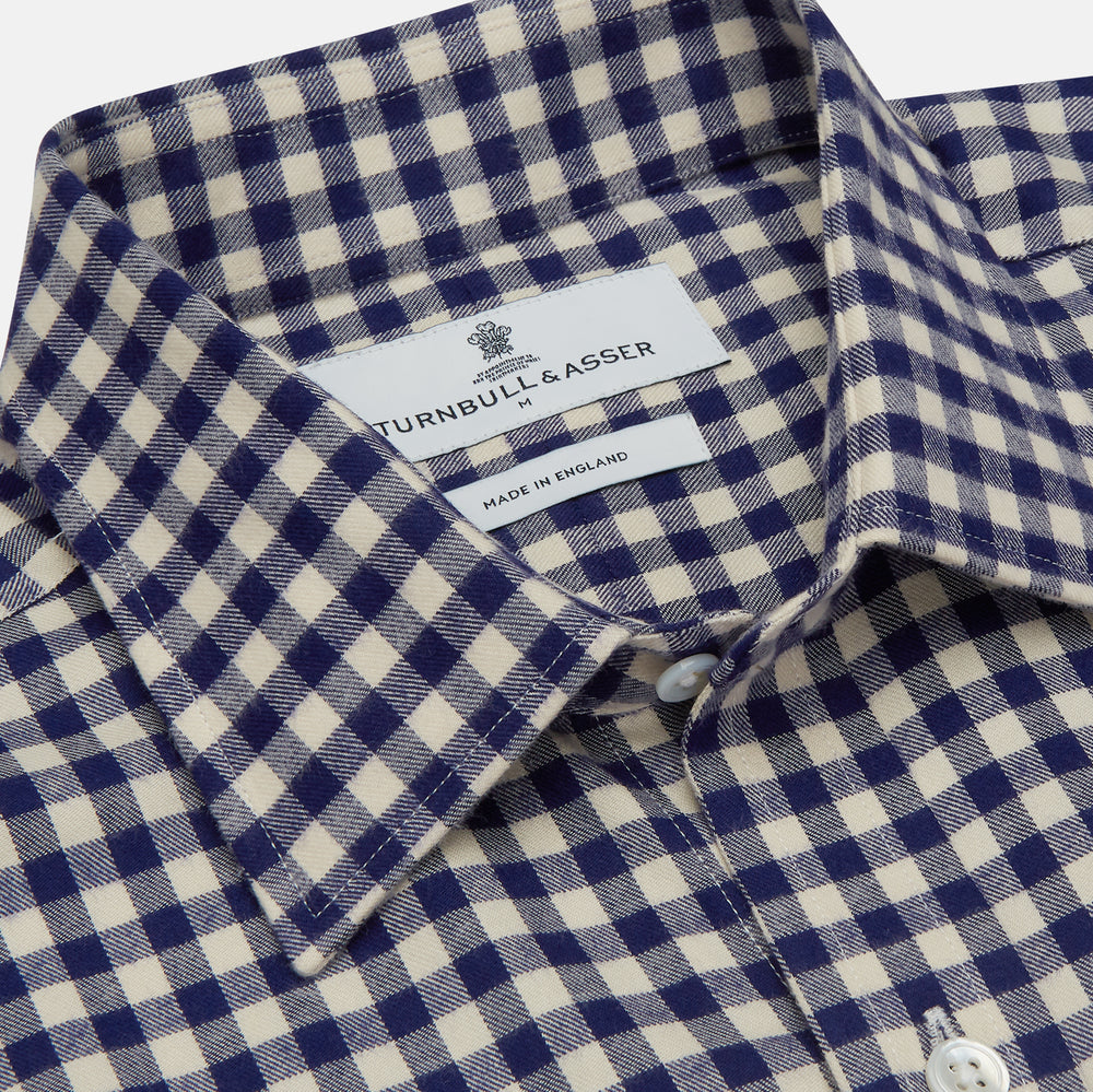 The Turnbull & Asser Blue Check Weekend Fit Shirt features a Derby collar and 1-button cuffs—ideal for winter layering. Shirt is laid flat on a white background.