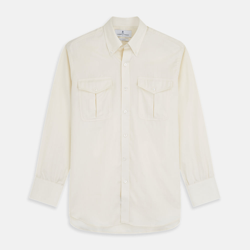 The Cream Herringbone Fine Cotton Weekend Officer Fit Shirt by Turnbull & Asser features a Dorset collar, long sleeves, two button-flap chest pockets, and buttoned cuffs—perfect for smart-casual style.
