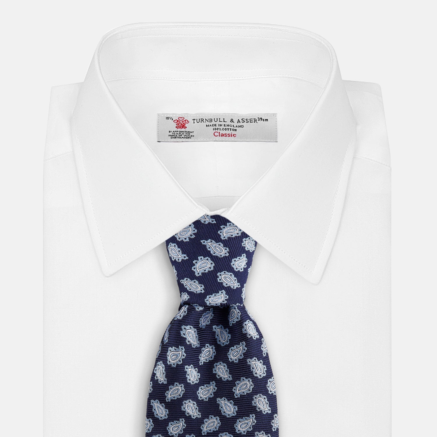 View 2 of product The Blue Abstract Paisley Silk Tie by Turnbull & Asser features a classic paisley motif in navy, offering a timeless touch to your wardrobe and perfectly capturing traditional elegance.