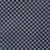 View 3 of product The Turnbull & Asser Blue Houndstooth Silk Tie, shown rolled on a plain white background, adds a refined touch to any sophisticated wardrobe.