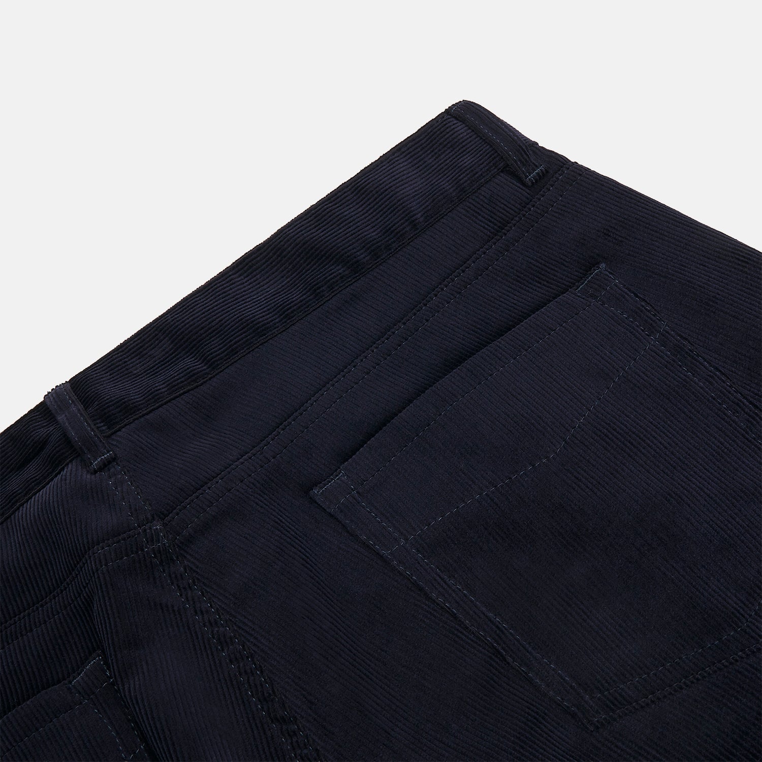 View 2 of product A pair of navy twill cotton five-pocket trousers from Turnbull & Asser, shown laid flat against a white background.