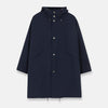 View 1 of product The Turnbull & Asser Navy Walter Sealup Parka with Detachable Liner features silver snap buttons, front flap pockets, and a drawstring hem. Styled against a white background, this waterproof parka offers both elegance and practicality for wet weather.