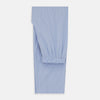 View 5 of product A man stands barefoot against a plain background, wearing a white short-sleeve T-shirt and Turnbull & Asser Blue Stripe Cotton Pyjama Trousers in a contemporary fit, looking straight ahead with a neutral expression.