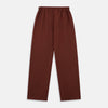 View 2 of product Turnbull & Asser’s Red Cotton-Cashmere Pyjama Trousers feature a contemporary straight-leg fit, elastic waistband, and dark red-brown hue, shown flat against a white background.