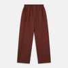 View 1 of product Turnbull & Asser’s Red Cotton-Cashmere Pyjama Trousers feature a contemporary straight-leg fit, elastic waistband, and dark red-brown hue, shown flat against a white background.