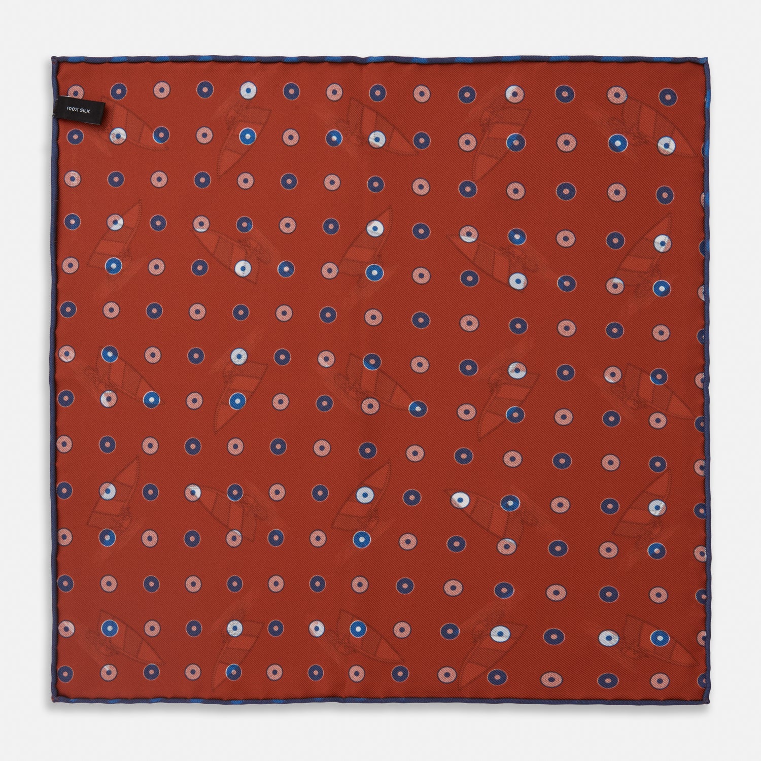 View 2 of product The Turnbull & Asser Red Windsurfer Double-Faced Silk Print Pocket Square features a vibrant windsurfer pattern on silk with a dark blue border and the brand subtly printed in one corner.