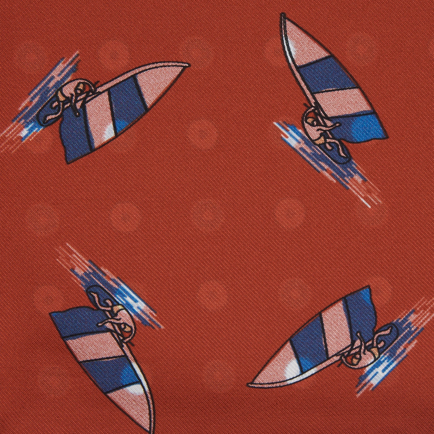 View 3 of product The Turnbull & Asser Red Windsurfer Double-Faced Silk Print Pocket Square features a vibrant windsurfer pattern on silk with a dark blue border and the brand subtly printed in one corner.