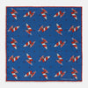 View 1 of product The Turnbull & Asser Blue Windsurfer Double-Faced Silk Print Pocket Square features a blue silk design with colorful windsurfers and vivid red edges, finished with the Turnbull & Asser logo in one corner.