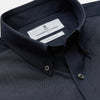 View 2 of product The Turnbull & Asser Navy Chambray Weekend Fit Shirt features a Dorset collar, long sleeves with 1-button cuffs, and two button-flap chest pockets. This officer’s shirt is displayed flat on a white background.