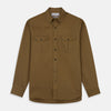 View 1 of product The Turnbull & Asser Khaki Cotton Weekend Fit Western Shirt features a Dorset collar, long sleeves, two button-flap chest pockets, and buttoned cuffs—an essential smart-casual piece shown against a white background.