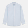 View 1 of product The Turnbull & Asser Sky Blue Chambray Stripe Weekend Fit Shirt features a Dorset collar, long sleeves, and two button-flap chest pockets, offering a relaxed look. Displayed on a plain white background.