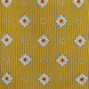 View 3 of product The Yellow Multi Floral Motif Silk Tie by Turnbull & Asser features subtle diagonal stripes and small white, blue, and orange floral motifs—a perfect summer palette, shown rolled up on a plain white background.