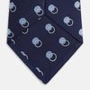 View 4 of product The Turnbull & Asser Navy Multi Circle Silk Tie showcases overlapping light blue and white rings on navy silk—a stylish choice to elevate bold shirts or bring visual interest to your summer look.