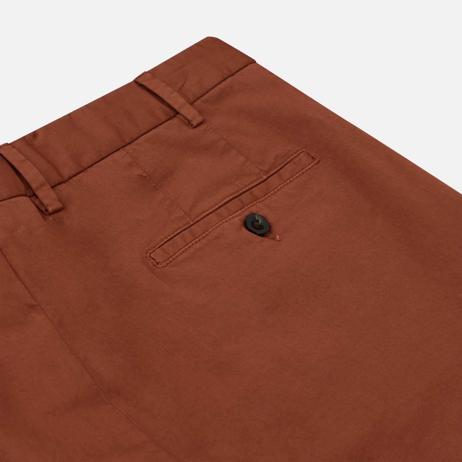 View 2 of product The Turnbull & Asser Orange Classic Chino Manson Trouser, crafted from cotton twill in Italy with a straight-leg fit and button-zip closure, is displayed flat against a plain white background.