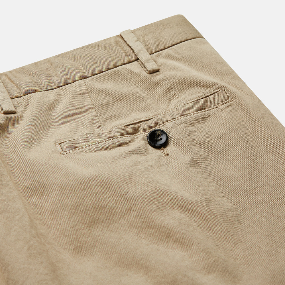 Turnbull & Asser's Taupe Classic Chino Manson Trouser, tailored in Italy from stretch cotton, features a button and zip closure, front pockets, and a straight-leg fit. Shown in taupe on a white background.