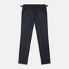 View 3 of product The Navy Escorial Wool Jonathan Trousers by Turnbull & Asser, featuring side adjusters, front pleats, and side pockets, are shown laid flat on a white background.