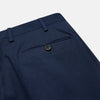 View 2 of product The Turnbull & Asser Navy Front Pleated Gerry Trouser is shown laid flat, featuring a classic straight leg, button and zip closure, belt loops, and crisp front pleats.