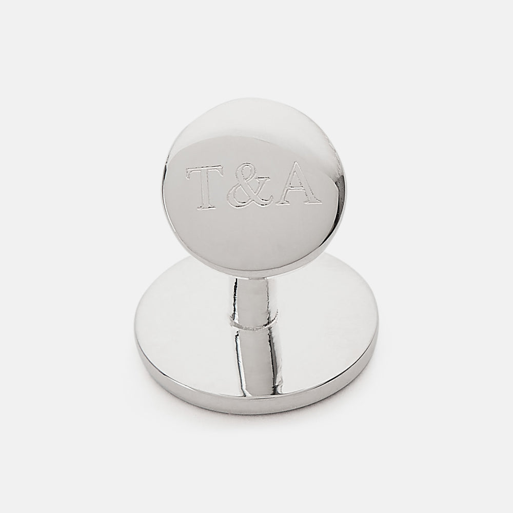 Turnbull & Asser's Pale Pink Sterling Silver Cufflinks feature a round design with a geometric square pattern on a pale pink background—an elegant accessory for men, displayed on a white surface.