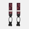 View 1 of product Two red paisley adjustable silk braces by Turnbull & Asser, featuring leather ends and silver clasps, are laid out vertically side by side on a white background.