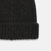 View 2 of product Turnbull & Asser's Charcoal Cashmere Ribbed Hat features a folded brim and soft cashmere construction, shown against a plain white background.