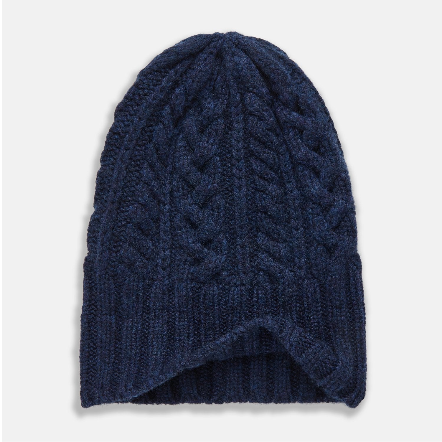 View 3 of product The Turnbull & Asser Navy Cashmere Cable Hat features a ribbed fold-over cuff and cable knit pattern, shown on a plain light background.
