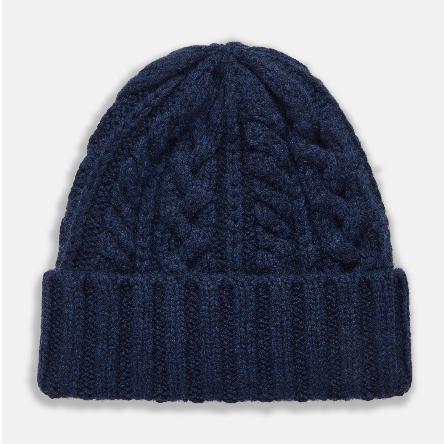 View 1 of product The Turnbull & Asser Navy Cashmere Cable Hat features a ribbed fold-over cuff and cable knit pattern, shown on a plain light background.