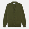 View 1 of product The Olive Lachlan Cashmere Cardigan by Turnbull & Asser features long sleeves, two front pockets, a V-neckline, and ribbed cuffs and hem—a smart-casual classic shown laid flat on a white background.