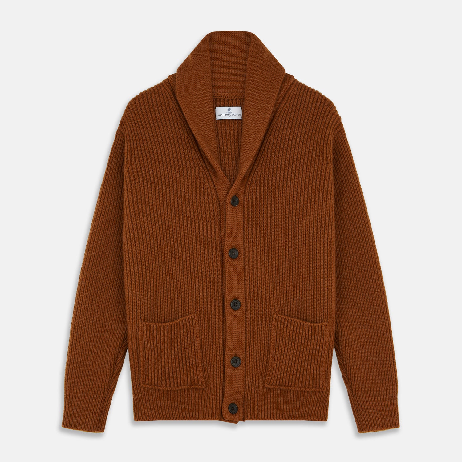 View 1 of product The Brown Ainsley Ribbed Shawl Cashmere Cardigan by Turnbull & Asser features a ribbed knit texture, black front buttons, and two front pockets, displayed laid flat on a white background.