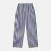 View 6 of product Turnbull & Asser's Blue Multi Stripe Cotton Modern Pyjama Set features a camp collar shirt with white buttons, front pocket, and long sleeves. Both pieces showcase classic blue and beige stripes for a timeless look.