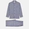View 1 of product Turnbull & Asser's Blue Multi Stripe Cotton Modern Pyjama Set features a camp collar shirt with white buttons, front pocket, and long sleeves. Both pieces showcase classic blue and beige stripes for a timeless look.