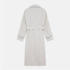 View 5 of product The Turnbull & Asser Brown Multi Check Cotton-Cashmere Gown features a shawl collar, front pocket, matching belt, and dark piping on the edges, sleeves, and pocket. Made in England and shown on a plain white background.