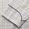 View 3 of product The Turnbull & Asser Brown Multi Check Cotton-Cashmere Gown features a shawl collar, front pocket, matching belt, and dark piping on the edges, sleeves, and pocket. Made in England and shown on a plain white background.