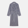 View 1 of product The Turnbull & Asser Blue Multi Stripe Cotton Gown features blue and white vertical stripes, long sleeves, a shawl collar, front pockets, and a matching waist tie, shown on a plain white background.