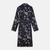 View 5 of product The Navy Floral Silk Jacquard Pierce Gown by Turnbull & Asser features a shawl collar, long sleeves, matching fabric belt, and elegant grey and blue floral design.