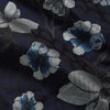 View 2 of product The Navy Floral Silk Jacquard Pierce Gown by Turnbull & Asser features a shawl collar, long sleeves, matching fabric belt, and elegant grey and blue floral design.