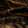 View 4 of product The Turnbull & Asser Gold Multi Floral Cotton, Wool & Silk Jacquard Pierce Gown features a shawl collar, matching belt, golden lining, and an elegant floral pattern in luxurious black, gold, and brown tones.