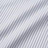View 5 of product A man wearing the Turnbull & Asser Grey Multi Stripe Regular Fit Twill Shirt with T&A Collar and Double Cuffs stands against a beige background, one hand in his pocket, looking at the camera.