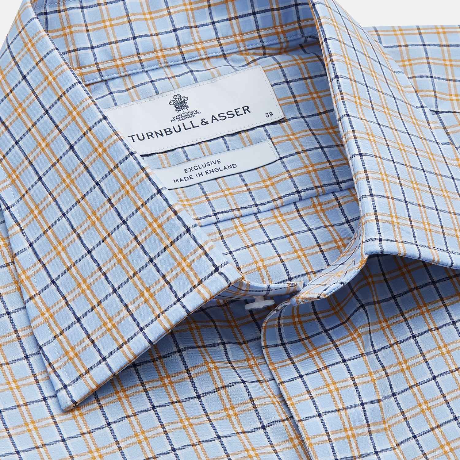 View 2 of product Turnbull & Asser Blue, Orange & Navy Check Regular Fit Shirt features a T&A collar and 3 button cuffs, made from Italian cotton poplin, shown flat on a white background.
