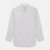 View 1 of product The Turnbull & Asser Purple Multi Stripe Tailored Fit Shelton Shirt features a Kent collar and buttoned cuffs, with a vertical pinstripe pattern, displayed flat on a white surface.