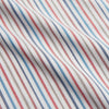 View 4 of product The Turnbull & Asser Burgundy Multi Stripe Tailored Fit Shirt features a Kent collar and 2 button cuffs, with vertical stripes on a light background. The shirt is neatly laid flat on a white surface.