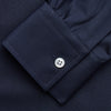 View 3 of product The Turnbull & Asser Navy Weekend Fit Shirt features a Dorset collar, 1 button cuffs, and white buttons, shown laid flat against a white background.