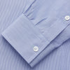 View 3 of product The Turnbull & Asser Pale Blue Weekend Fit Shirt with a Long Point collar and single button cuffs is laid flat on a white background.